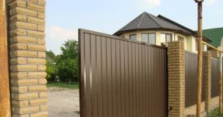 Купить откатные ворота из профнастила Кумертау, цена от 1802 руб.